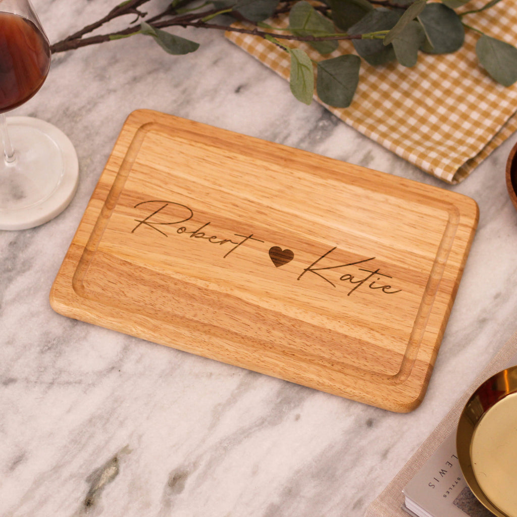 Personalised Wooden Heart And Names Chopping Board